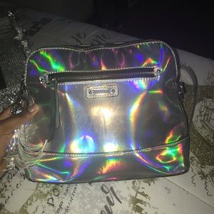 I am selling an iridescent purse